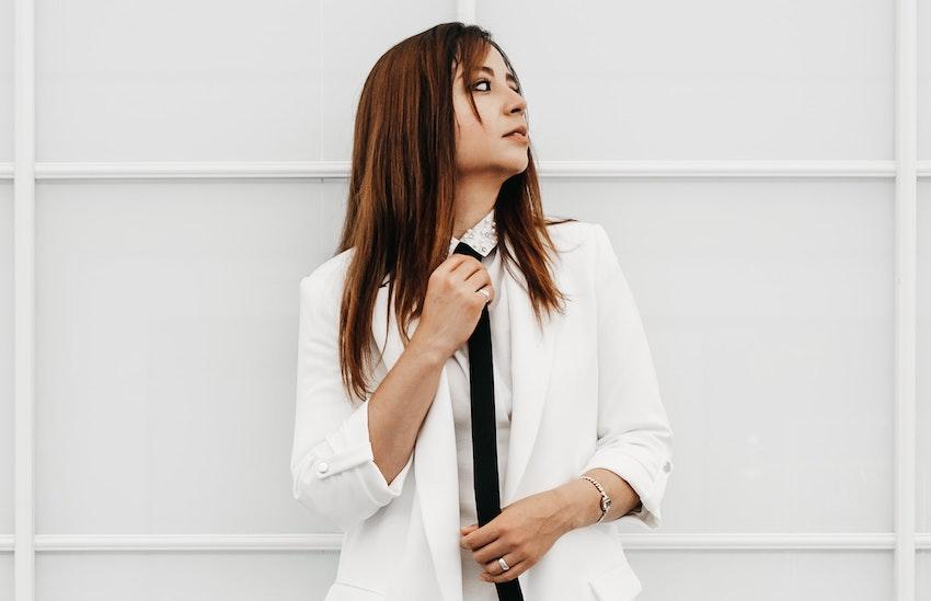 woman in a white suit