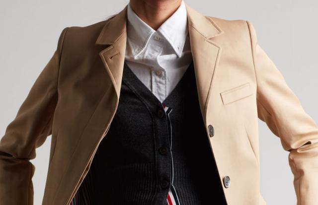 man in a suit and trench coat