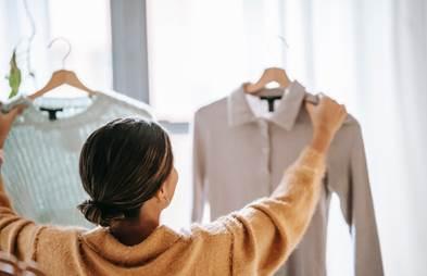woman choosing a top