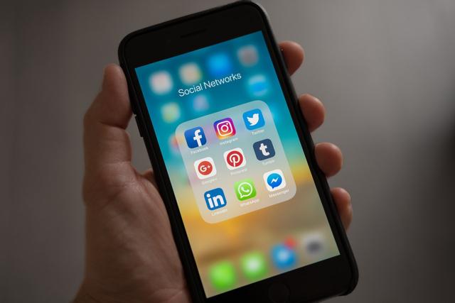 smartphone with social media apps pulled up