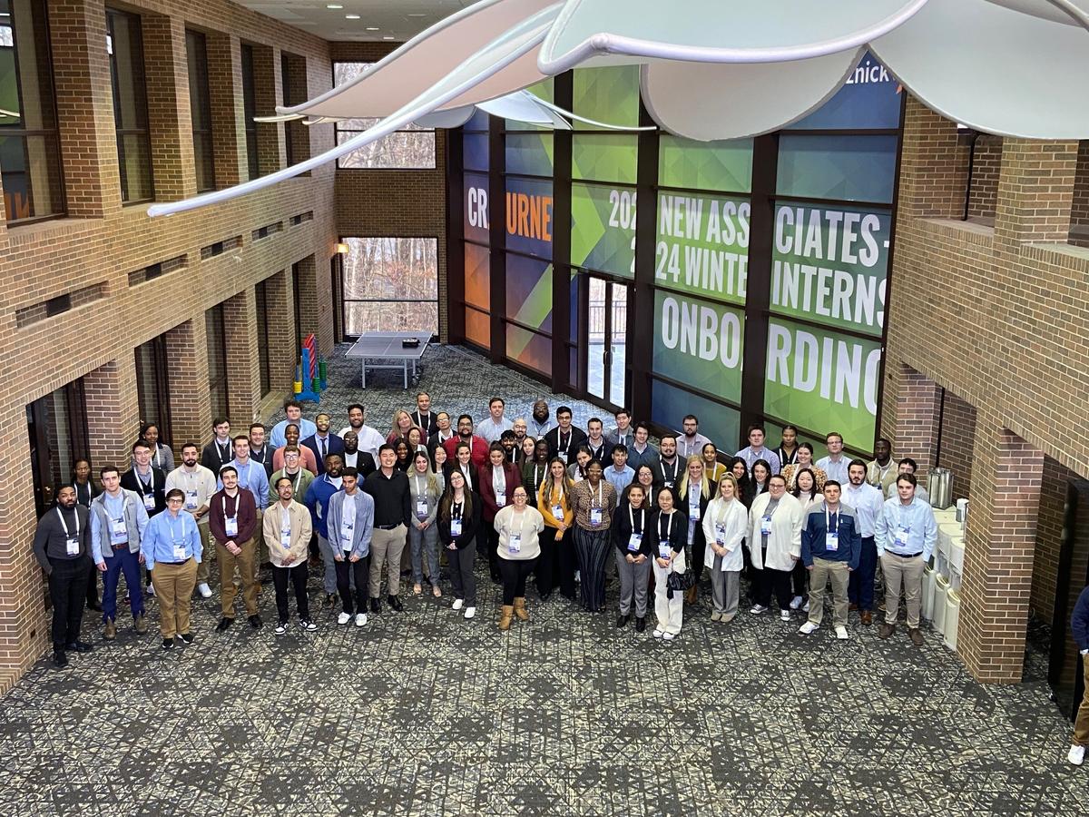 employees posing for a group shot