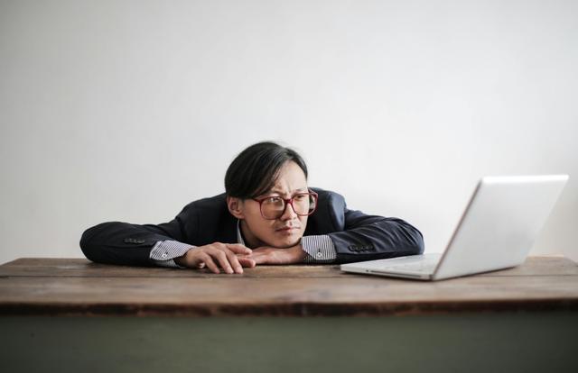 man working at his laptop