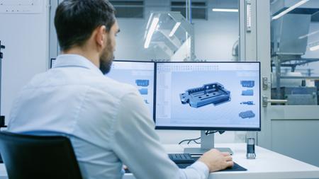 man working on a CAD project